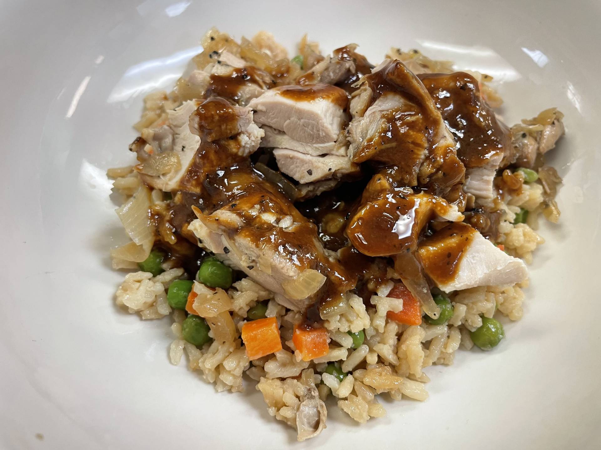 Chicken Adobo Thighs on Vegetable Fried Rice