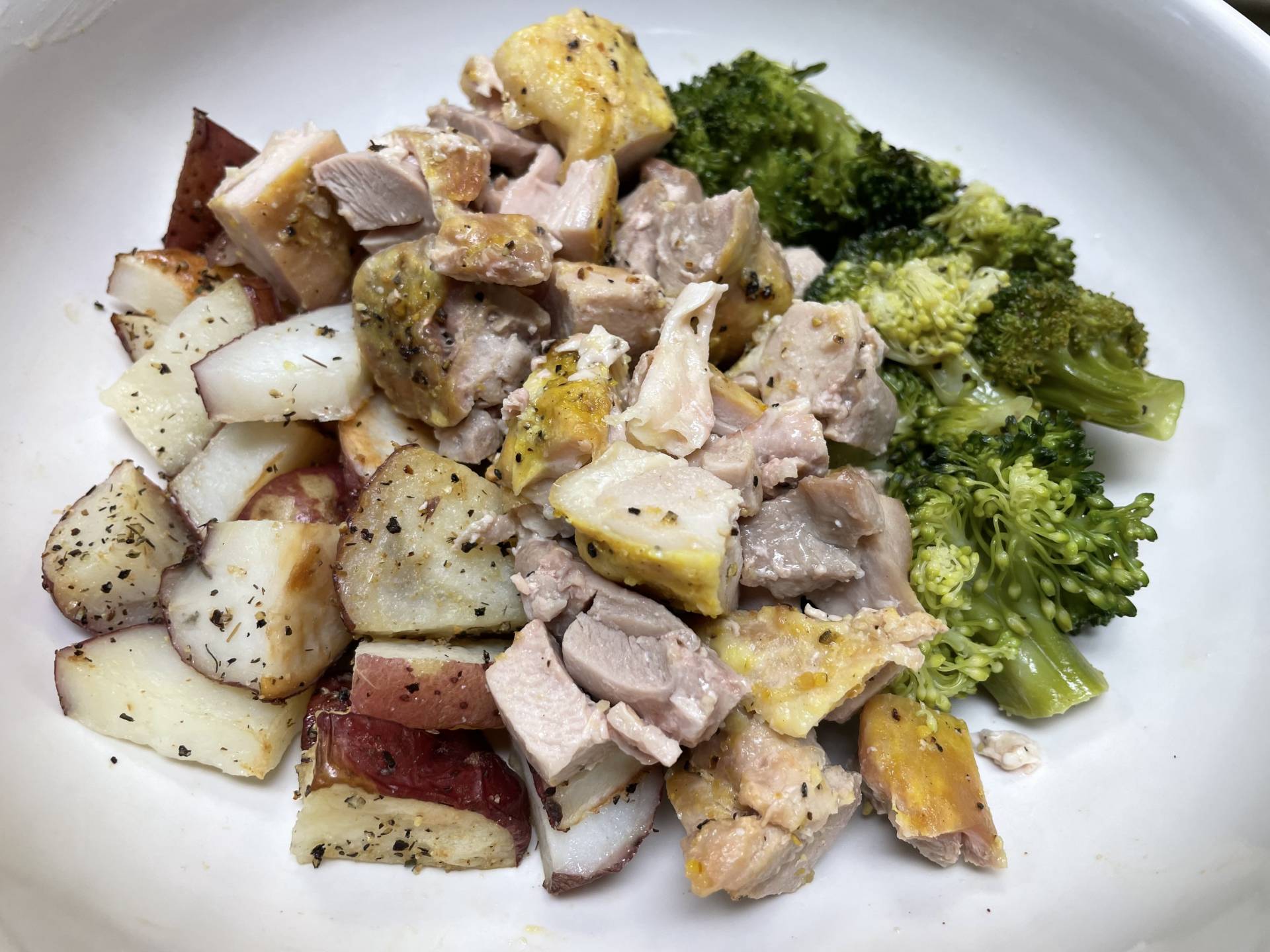 Lemon Pepper Chicken Thighs with Roast Potatoes and Steamed Broccoli