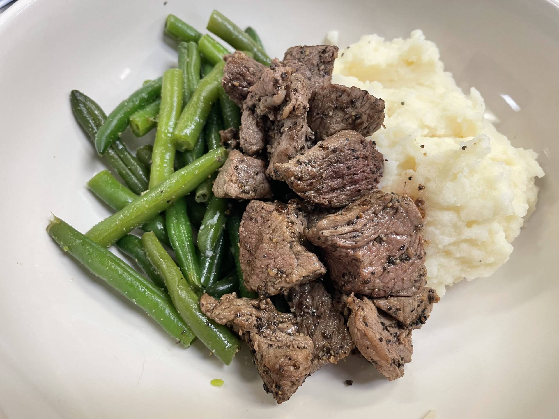 Peppered Beef Tips with Mashed Potatoes and Roast Zucchini and Squash